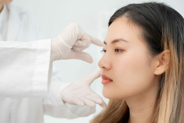 plastic surgery, beauty, Surgeon or beautician touching woman fa Plastic Surgery, Beauty, Surgeon Or Beautician Touching Woman Fa