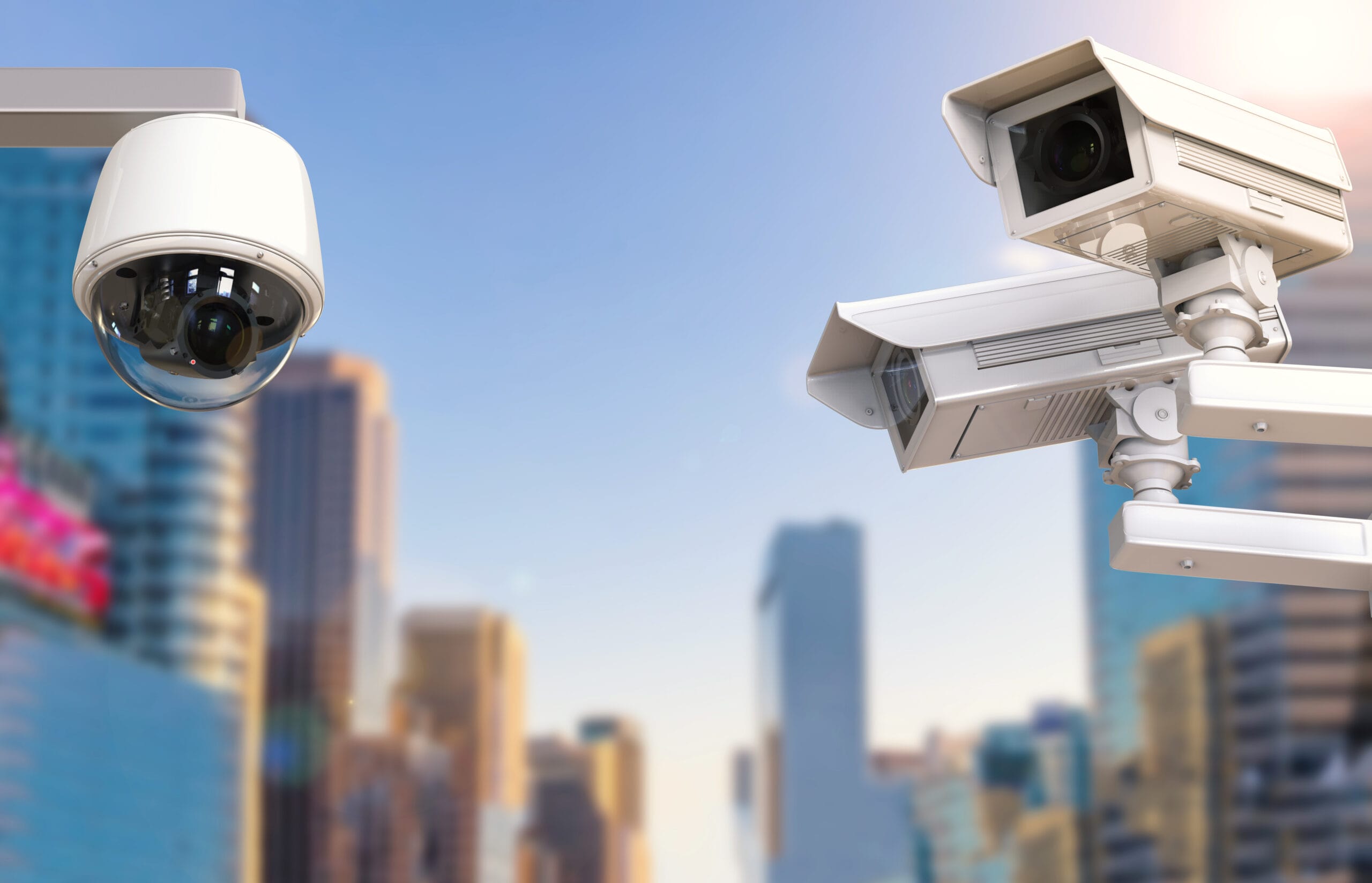 Cctv Camera Or Security Camera On Cityscape Background