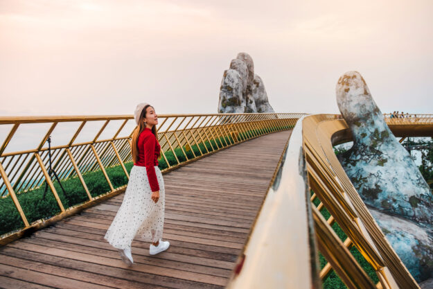 Travel Woman At Golden Bridge In Ba Na Hills ,danang Vietnam